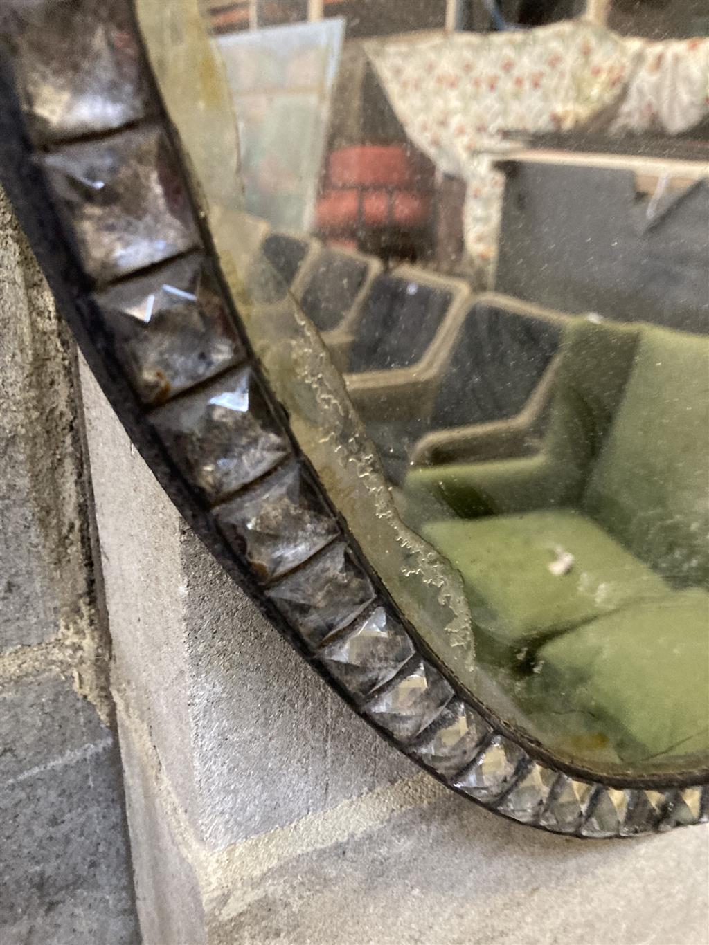 An oval Irish style wall mirror, width 48cm, height 64cm